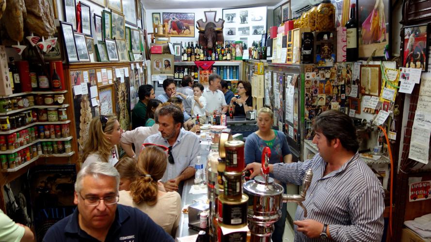 An abacería--part grocery store, part tapas bar--is the ideal place to rub elbows with locals. (Rick Steves, Rick Steves’ Europe)